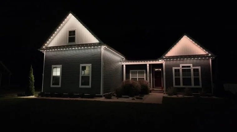 Minleon permanent LED pebble lighting in warm white on a home in Lincoln, NE
